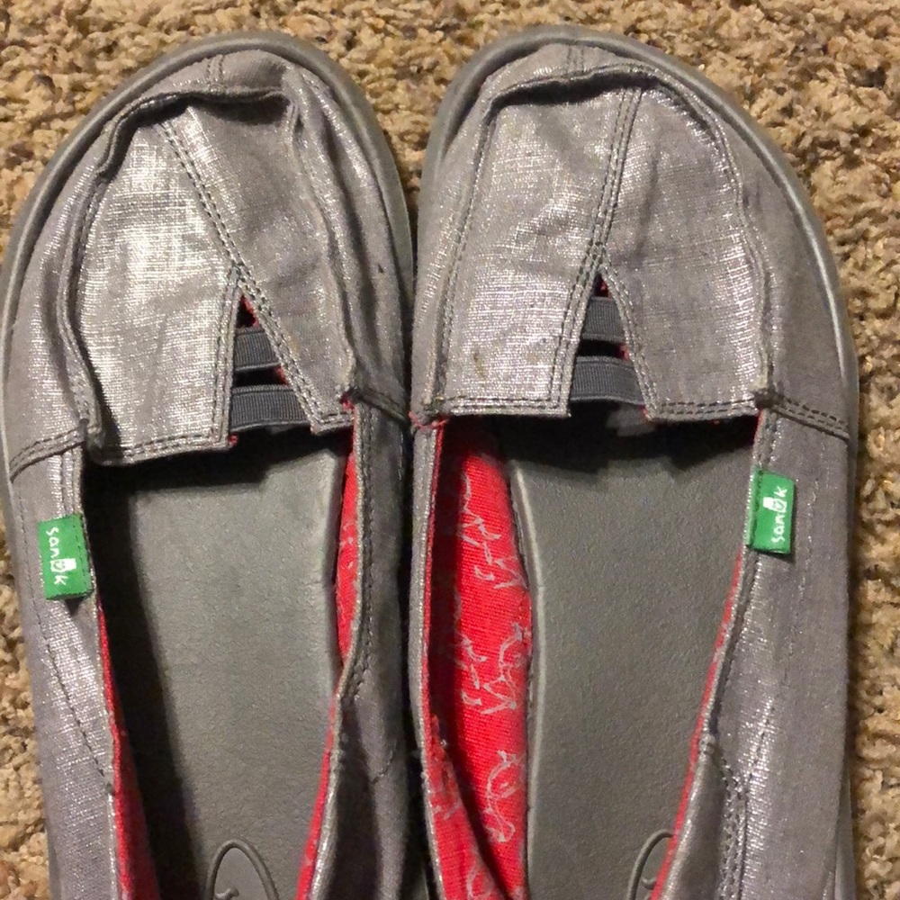 Barely worn Silver Sanuk Size 6